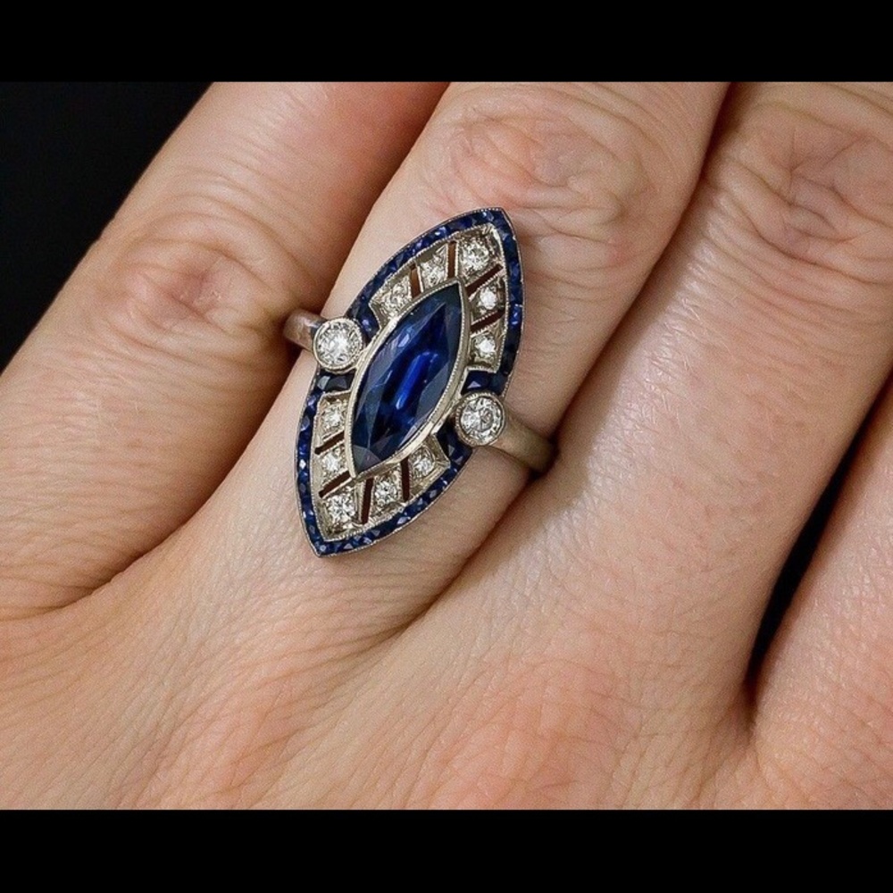 Sliver cubic zirconia/sapphire Art Deco ring.